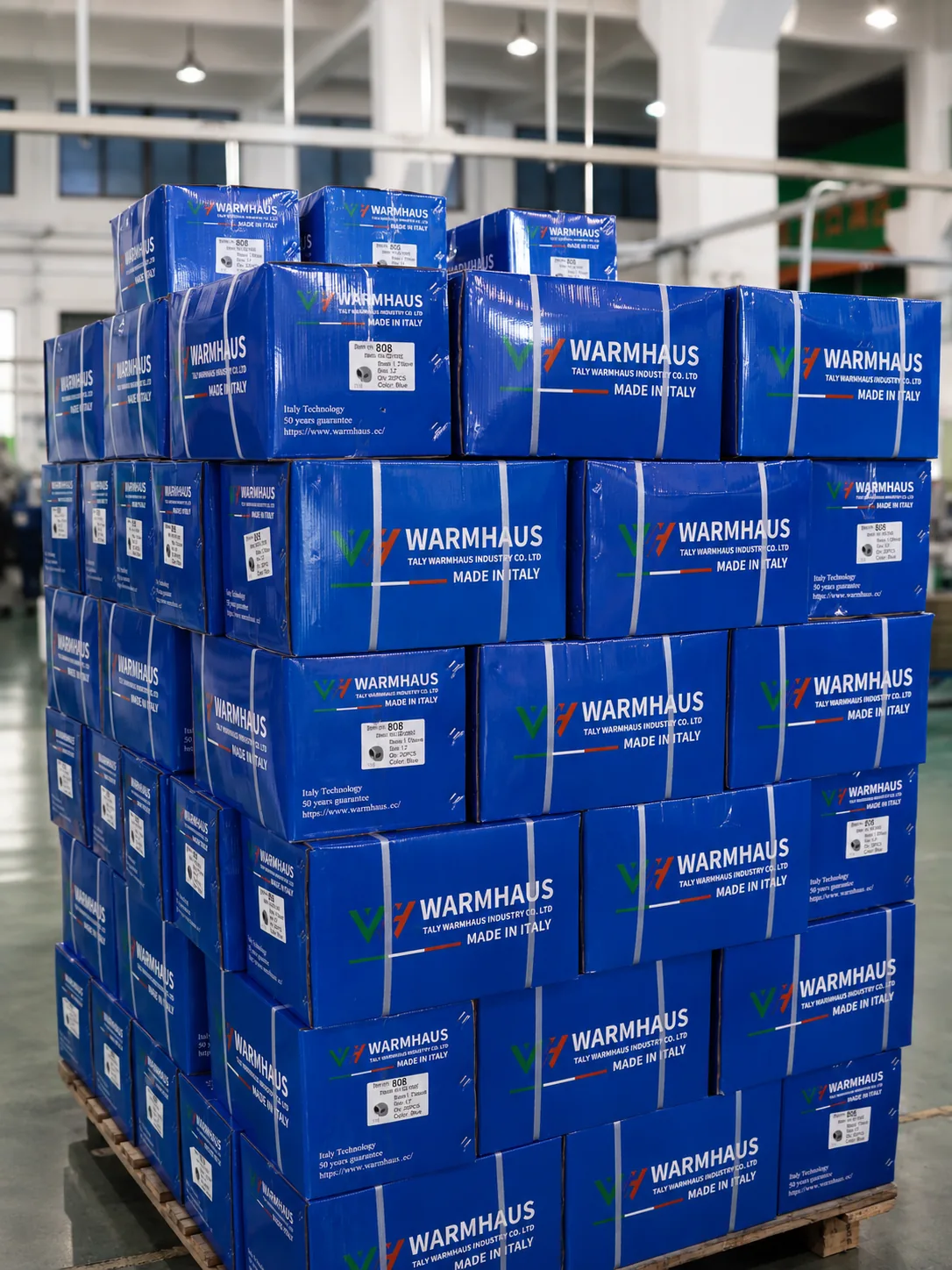 Pallet of WARMHAUS export cartons in the finished goods warehouse, ready for private-label printing