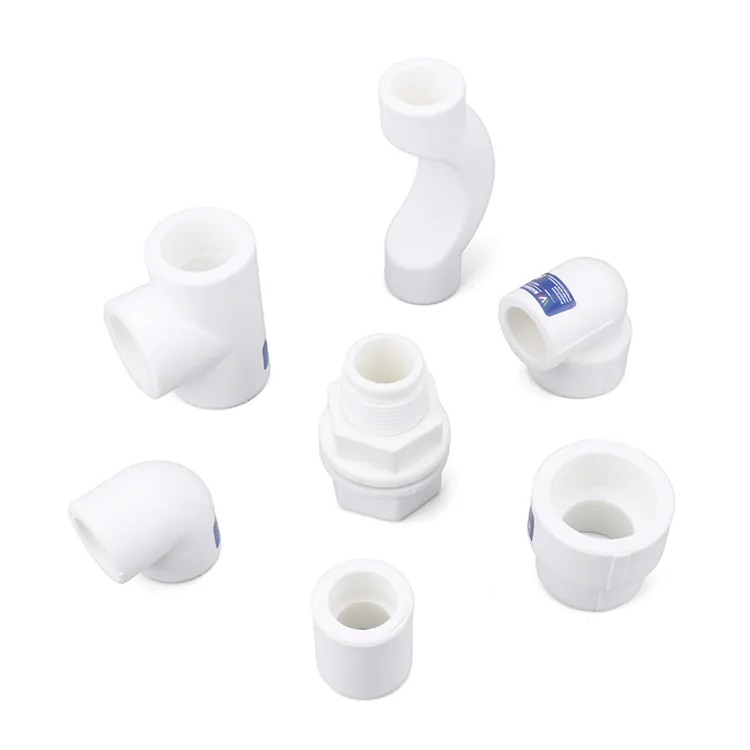 White polypropylene fittings arranged on a white background beside brass-threaded transition pieces from the same range