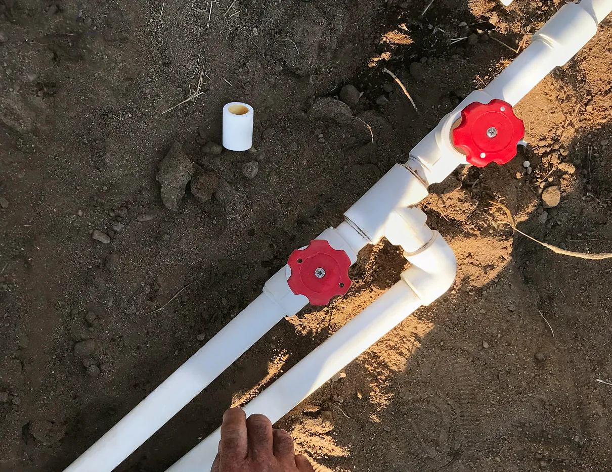 PPR ball valves welded into a hot water riser on a construction site