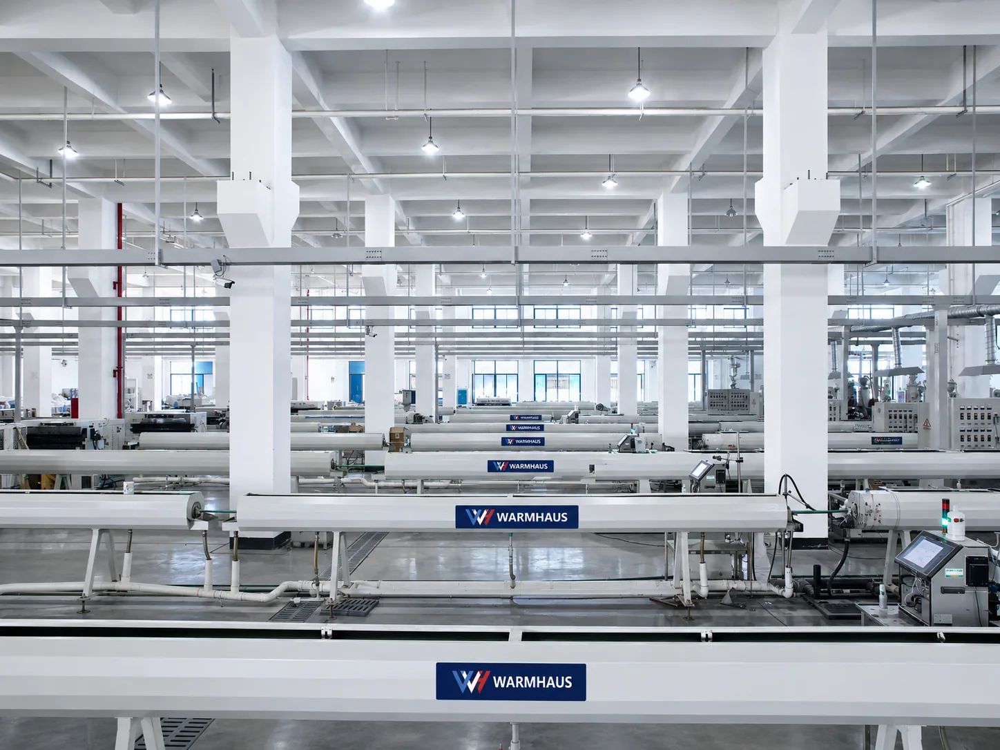 Inside the WARMHAUS production hall, with PPR extrusion lines running