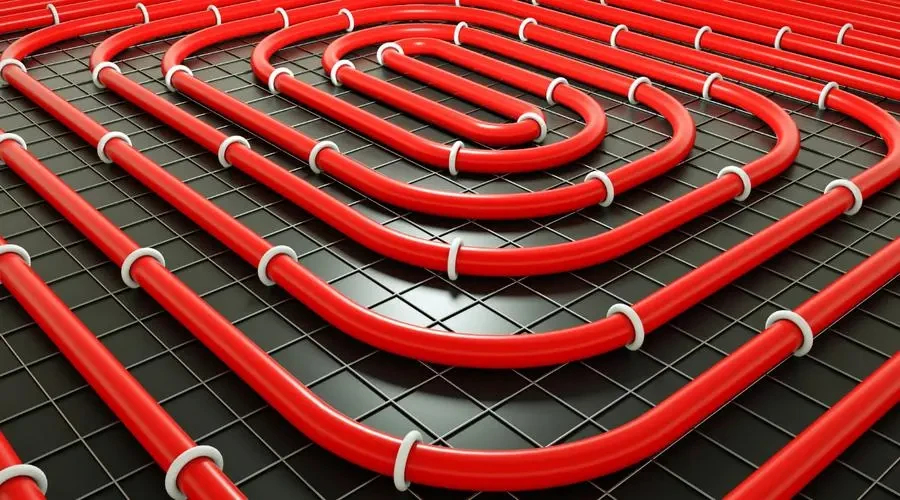 WARMHAUS underfloor heating pipe loops clipped to insulation before screed